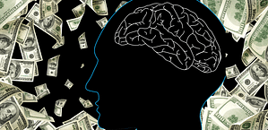 A silhouette of a person with a brain surrounded by money. Your Money Mindset