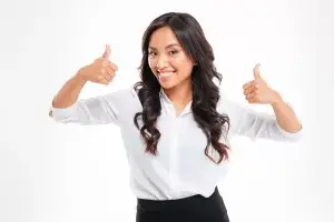 Happy asian businesswoman with thumbs up isolated on white background