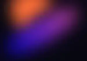 An image of an orange and purple blurred background.