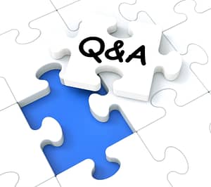 A print with a puzzel piece left with the letter Q&A on it.
