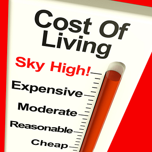 A print with a thermometer showing cost-of-living