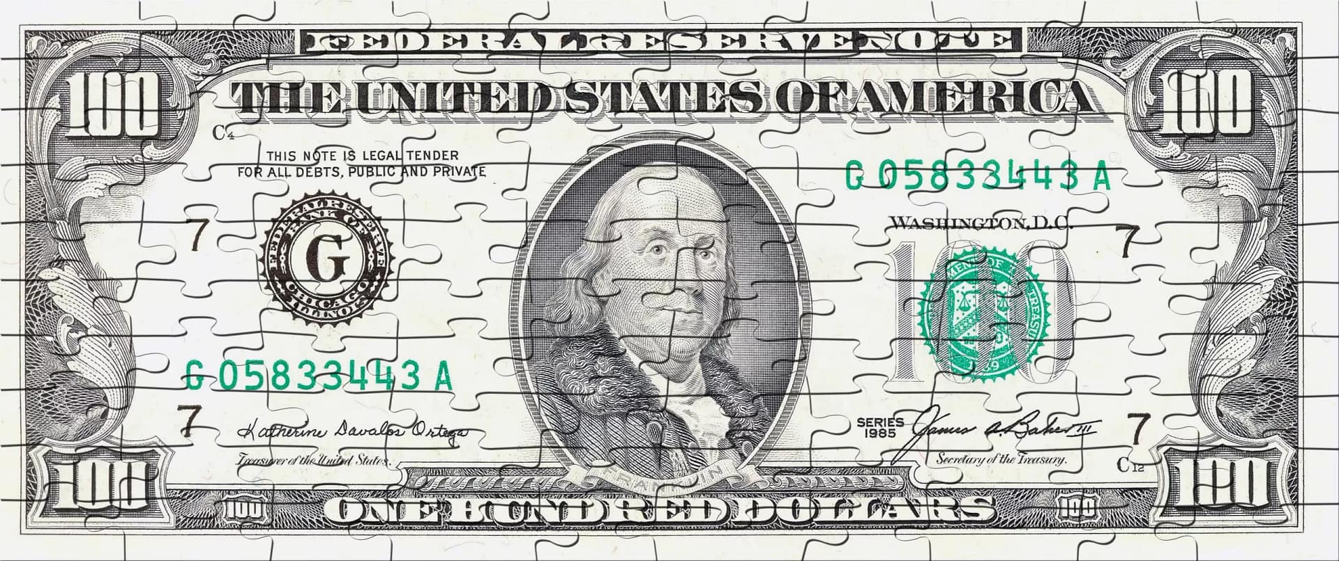 a print of a 100 dollar bill in puzzle format
