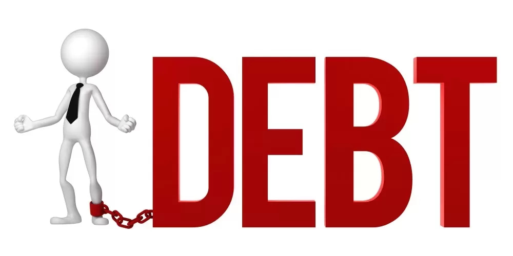 A man is chained to a chain with the word debt, seeking debt reduction services.